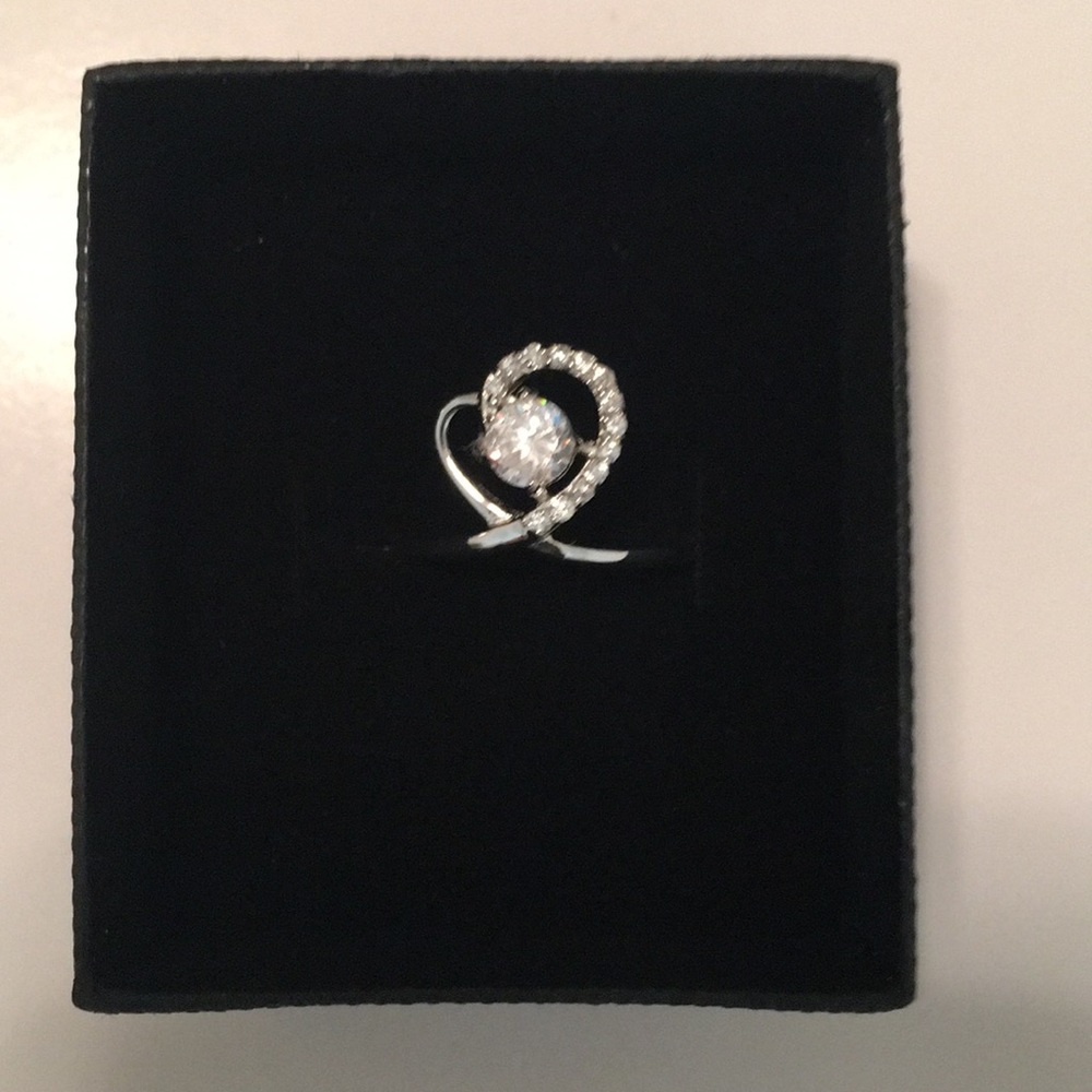 Sterling silver heart-shaped ring w/ dazzling CZ’s